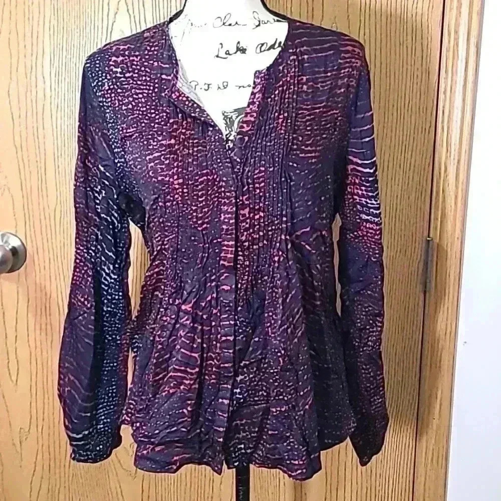 Tribal abstract animal print smocked v-neck button up top